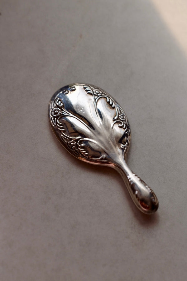 Ornate Silver Hand Mirror