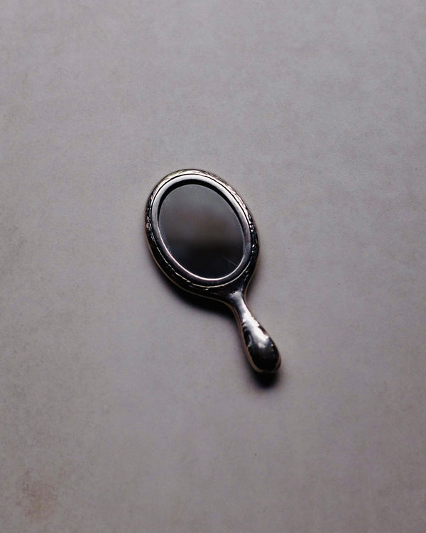 Ornate Silver Hand Mirror