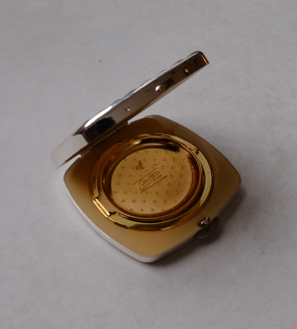 Ribbed Silver-tone compact