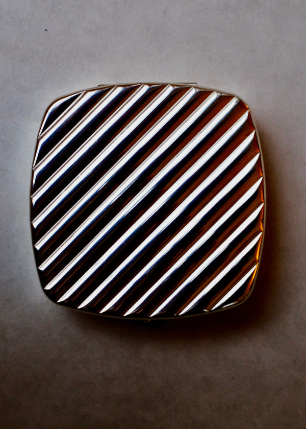 Ribbed Silver-tone compact