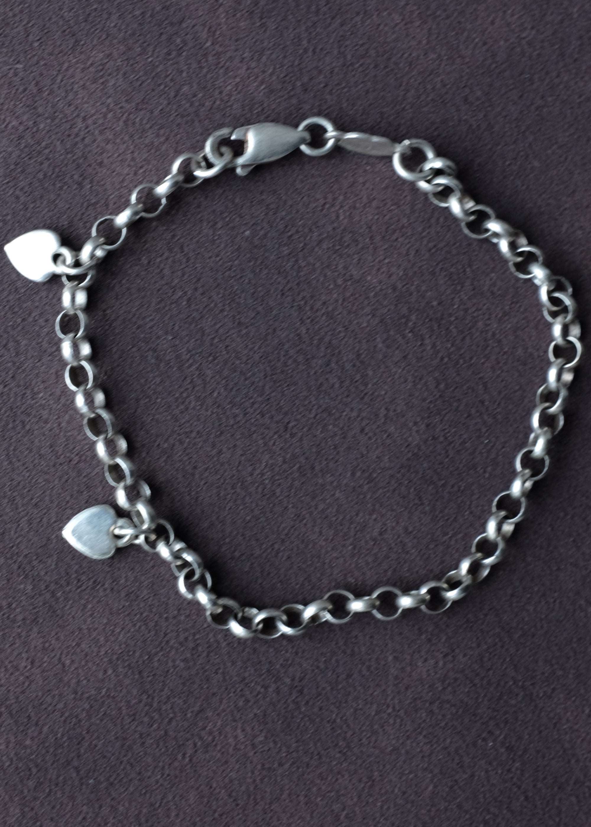 STERLING SILVER MINI HEART CHARM CURB BRACELET