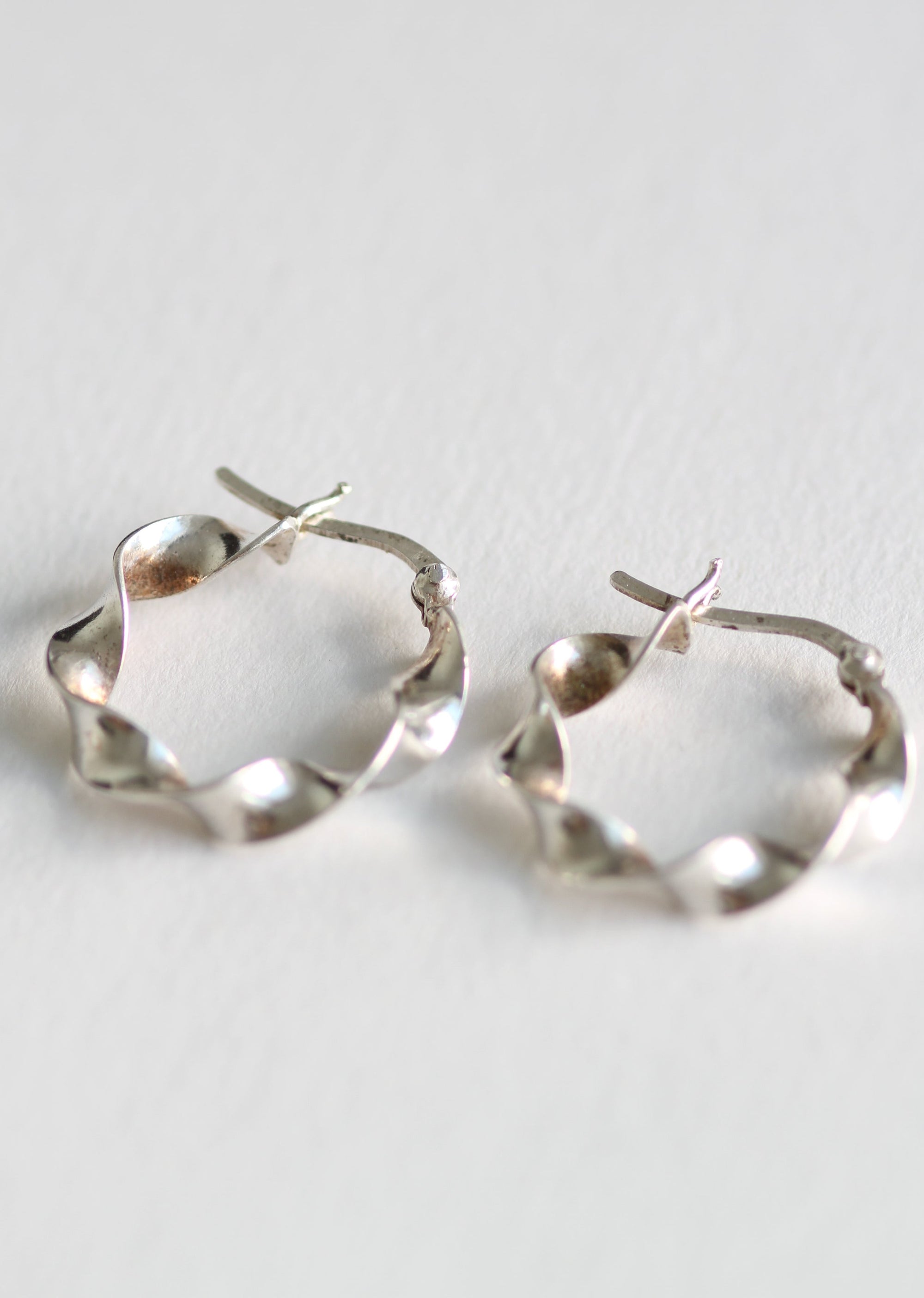 STERLING SILVER TWISTED HOOPS