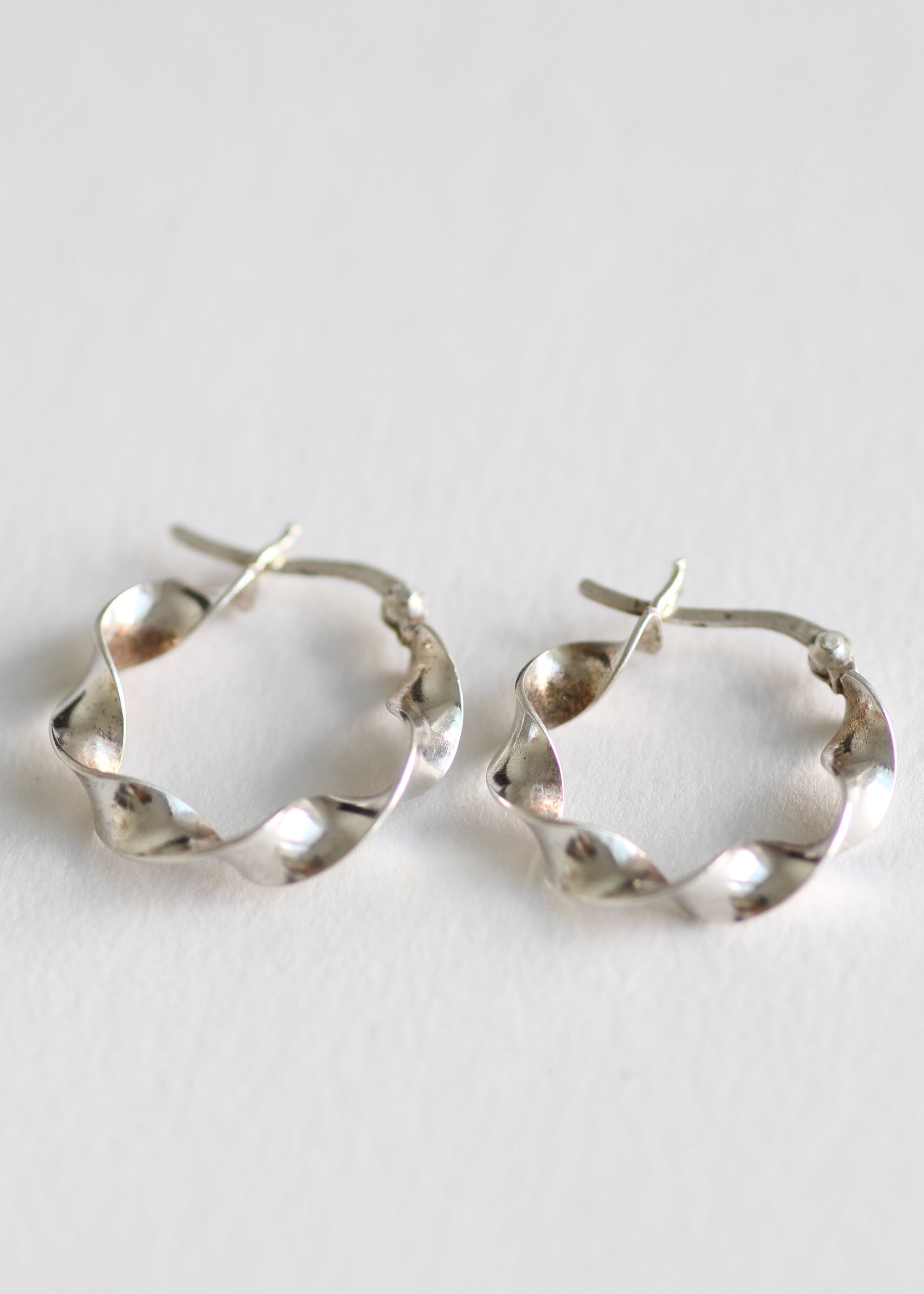 STERLING SILVER TWISTED HOOPS